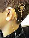 boy with hearing device 